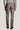 Light brown mini houndstooth trousers with flat front and back pockets, shown from rear view on model wearing gray sweater.