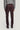 Burgundy chino pants with flat front and side pockets, worn with gray ribbed sweater and black shoes.