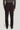 Dark brown tailored trousers with side tabs and front pockets, shown from behind on a model wearing a gray sweater.